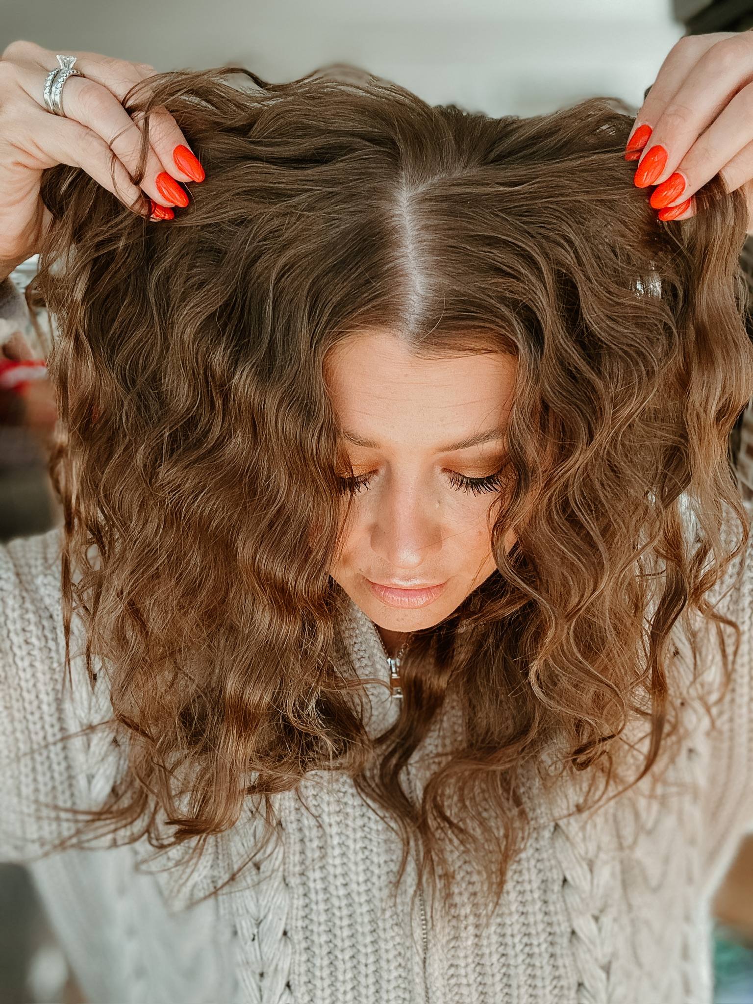 Savannah Kreger showing voluminous wavy hair styled with L’ange tools, shiny healthy strands, natural texture, protected with L’ange Rival Heat Shield, must-have L’ange hair products, best heat protectant spray, salon-quality waves, everyday hair care, long-lasting style