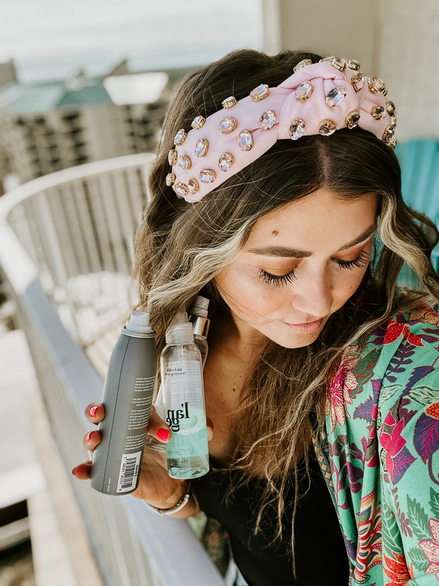Savannah Kreger holding L’ange Salt and Sea Texturizing Spray, beachy waves, effortless textured hair, must-have L’ange styling products, best hair spray for volume and texture, shiny healthy strands, everyday hair care, salon-quality styles at home, lightweight sea salt spray
