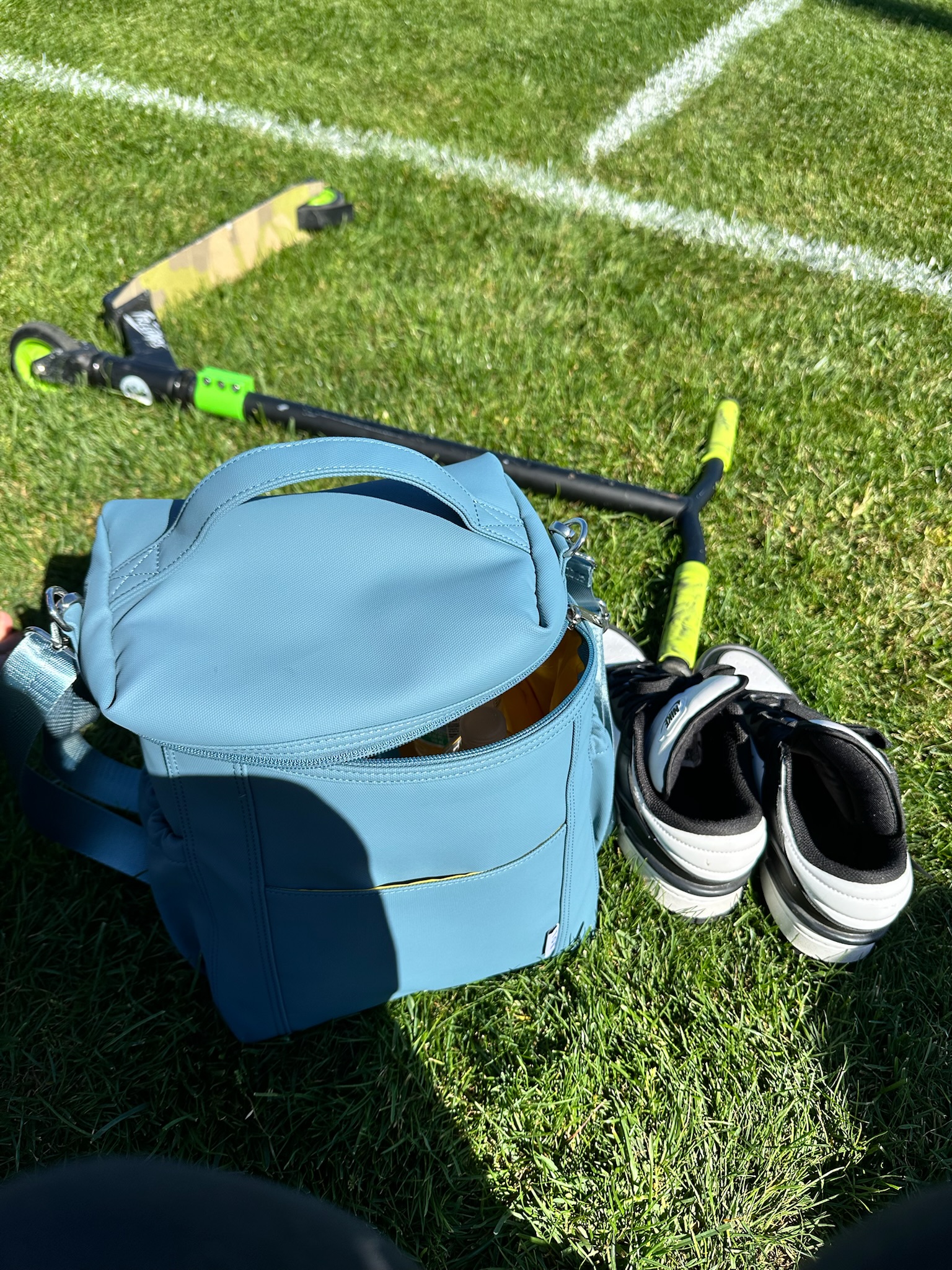 thesavannahk featuring lightweight blue cooler bag for snacks at kids sports game with sneakers and scooters, practical mom life essentials