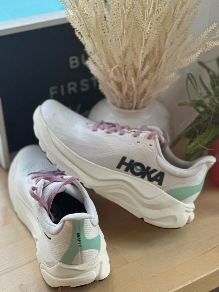 HOKA Arahi running shoes in neutral tones styled for walking workouts and daily movement, part of a busy mom sustainable weight loss and wellness routine.